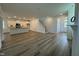 Open floor plan with kitchen, living area, and hardwood floors at 146 Swain St, Clayton, NC 27527