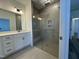 Modern bathroom with walk-in shower and double vanity at 146 Swain St, Clayton, NC 27527