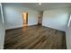 Spacious bedroom with hardwood floors and attached bathroom at 146 Swain St, Clayton, NC 27527