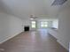 Open concept living area with fireplace and kitchen at 231 Lotus Ave, Smithfield, NC 27577