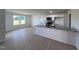 Modern kitchen with granite countertops and white cabinets at 231 Lotus Ave, Smithfield, NC 27577