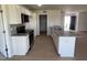 Kitchen with granite countertops, island, and stainless steel appliances at 231 Lotus Ave, Smithfield, NC 27577