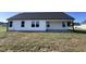 House exterior showcasing a large backyard and patio at 231 Lotus Ave, Smithfield, NC 27577