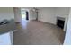 Spacious living room with fireplace and laminate flooring at 231 Lotus Ave, Smithfield, NC 27577