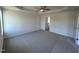 Bright bedroom featuring carpet flooring and access to bathroom at 231 Lotus Ave, Smithfield, NC 27577