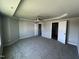 Main bedroom with ceiling fan and access to bathroom at 218 Lotus Ave, Smithfield, NC 27577