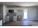 Eat-in kitchen featuring a view to the backyard at 218 Lotus Ave, Smithfield, NC 27577