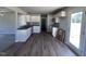 Modern kitchen with white cabinets and gray backsplash at 218 Lotus Ave, Smithfield, NC 27577