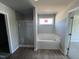 Bathroom with soaking tub and separate shower at 218 Lotus Ave, Smithfield, NC 27577