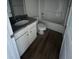 Clean bathroom with granite countertop, white cabinets, and a bathtub at 218 Lotus Ave, Smithfield, NC 27577