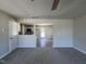 Open living room with kitchen and dining area view at 218 Lotus Ave, Smithfield, NC 27577