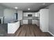 Modern kitchen with white cabinets and granite countertops at 138 Lotus Ave, Smithfield, NC 27577