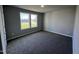 Bright bedroom featuring neutral walls and carpet at 138 Lotus Ave, Smithfield, NC 27577