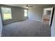 Spacious main bedroom with gray walls, carpet flooring, and a private bathroom at 138 Lotus Ave, Smithfield, NC 27577