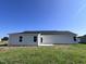 Rear view of the house showcasing a large backyard at 138 Lotus Ave, Smithfield, NC 27577