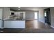 Modern kitchen with white cabinets, granite countertops, and a breakfast bar at 138 Lotus Ave, Smithfield, NC 27577