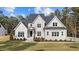 Beautiful two-story home with brick and siding exterior and landscaping at 2812 Theresa Eileen Way, Raleigh, NC 27603