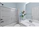 Clean bathroom with a shower/tub combo and white vanity at 19 Silverside Dr, Angier, NC 27501