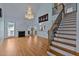 Bright living room with hardwood floors and fireplace at 19 Silverside Dr, Angier, NC 27501