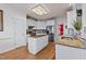 Modern kitchen with white cabinets and granite counters at 19 Silverside Dr, Angier, NC 27501
