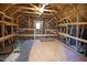 Unfinished attic space with exposed framing and subfloor at 135 Grading Stick Ct, Angier, NC 27501