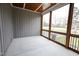 Relaxing screened porch with wood ceilings and a view of the backyard at 1203 Keith Hills Rd, Lillington, NC 27546