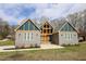 Modern home with gray siding and unique design at 1203 Keith Hills Rd, Lillington, NC 27546