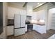 Modern kitchen with stainless steel appliances and white cabinets at 1203 Keith Hills Rd, Lillington, NC 27546