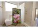 Luxurious bathroom with a soaking tub, glass shower, and stylish room divider at 1203 Keith Hills Rd, Lillington, NC 27546