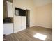 Bonus room featuring wood-look floors and access to a bathroom at 1203 Keith Hills Rd, Lillington, NC 27546