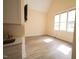 Bright bonus room with wood-look floors and large windows at 1203 Keith Hills Rd, Lillington, NC 27546