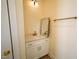 Small bathroom with vanity and a mirror at 1203 Keith Hills Rd, Lillington, NC 27546