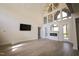 Two story living room with high ceilings and fireplace at 1203 Keith Hills Rd, Lillington, NC 27546