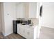 Small kitchen with white cabinets, microwave, and mini-fridge at 1203 Keith Hills Rd, Lillington, NC 27546