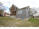 Gray house exterior with screened porch and large windows at 1203 Keith Hills Rd, Lillington, NC 27546