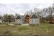 Modern home with gray siding and unique design at 1203 Keith Hills Rd, Lillington, NC 27546