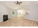 Spacious living room with fireplace and vaulted ceiling at 114 Shaman Dr, Louisburg, NC 27549