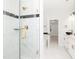 Elegant bathroom with a large walk-in shower and marble tile at 114 Shaman Dr, Louisburg, NC 27549