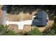 Aerial view of house, driveway, and surrounding woods at 114 Shaman Dr, Louisburg, NC 27549
