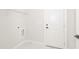 Laundry room includes shelving and built-in space for washer and dryer at 114 Shaman Dr, Louisburg, NC 27549
