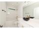 Bathroom features a black vessel sink, white vanity, and a shower/tub combo at 114 Shaman Dr, Louisburg, NC 27549