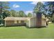 Brick ranch home with a patio and large backyard at 2400 Carbonton Rd, Sanford, NC 27330