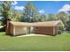 Brick ranch home with patio and fenced backyard at 2400 Carbonton Rd, Sanford, NC 27330