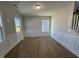 Dining room with hardwood floors and white wainscoting at 1013 Bostonian Dr, Knightdale, NC 27545