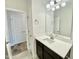 Bathroom with a single vanity and view of closet at 36 Kevior Ave, Four Oaks, NC 27524