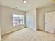Bedroom with double door closet and carpeted floor at 36 Kevior Ave, Four Oaks, NC 27524