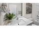 Modern bathroom with quartz vanity and bathtub at 2209 Fletchers Ridge Dr, Durham, NC 27703
