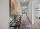 Bright hallway with glass-top console table at 2209 Fletchers Ridge Dr, Durham, NC 27703