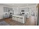 Modern kitchen featuring a granite countertop island and stainless steel appliances at 2209 Fletchers Ridge Dr, Durham, NC 27703