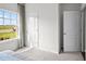 Bright bedroom with large window and closet at 2209 Fletchers Ridge Dr, Durham, NC 27703